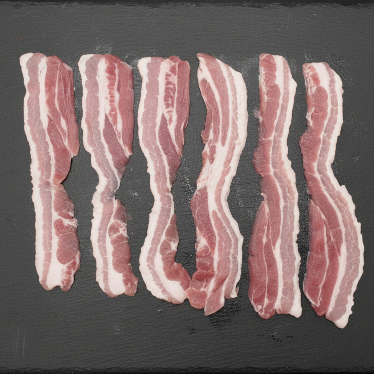 John Howe Dry Cured Unsmoked Streaky Bacon